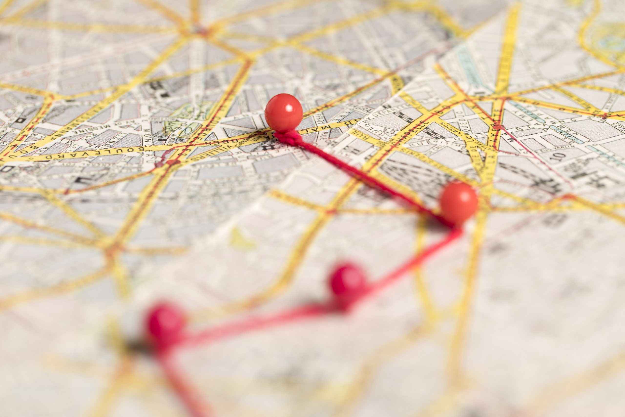 blurred red pins